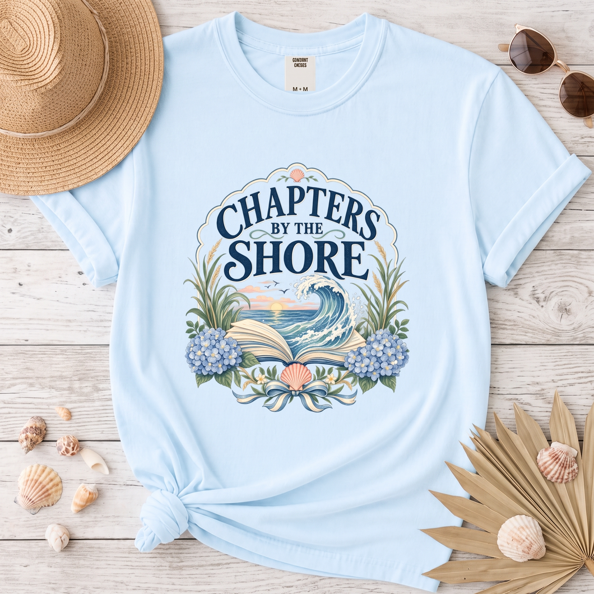 Chapters by the Shore Coastal Book Lover Graphic Tee