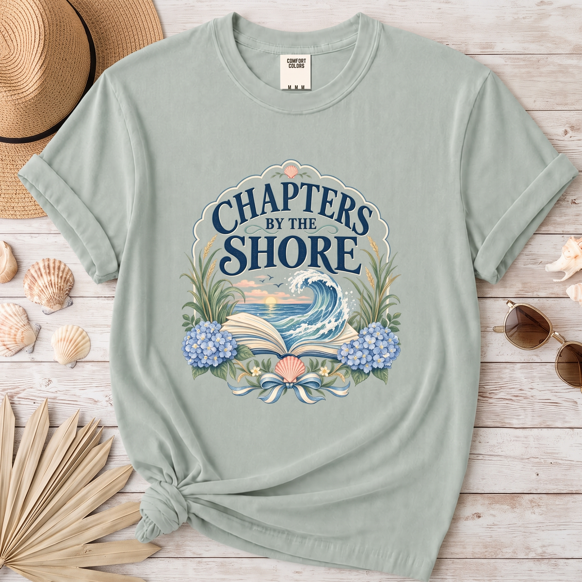 Chapters by the Shore Coastal Book Lover Graphic Tee