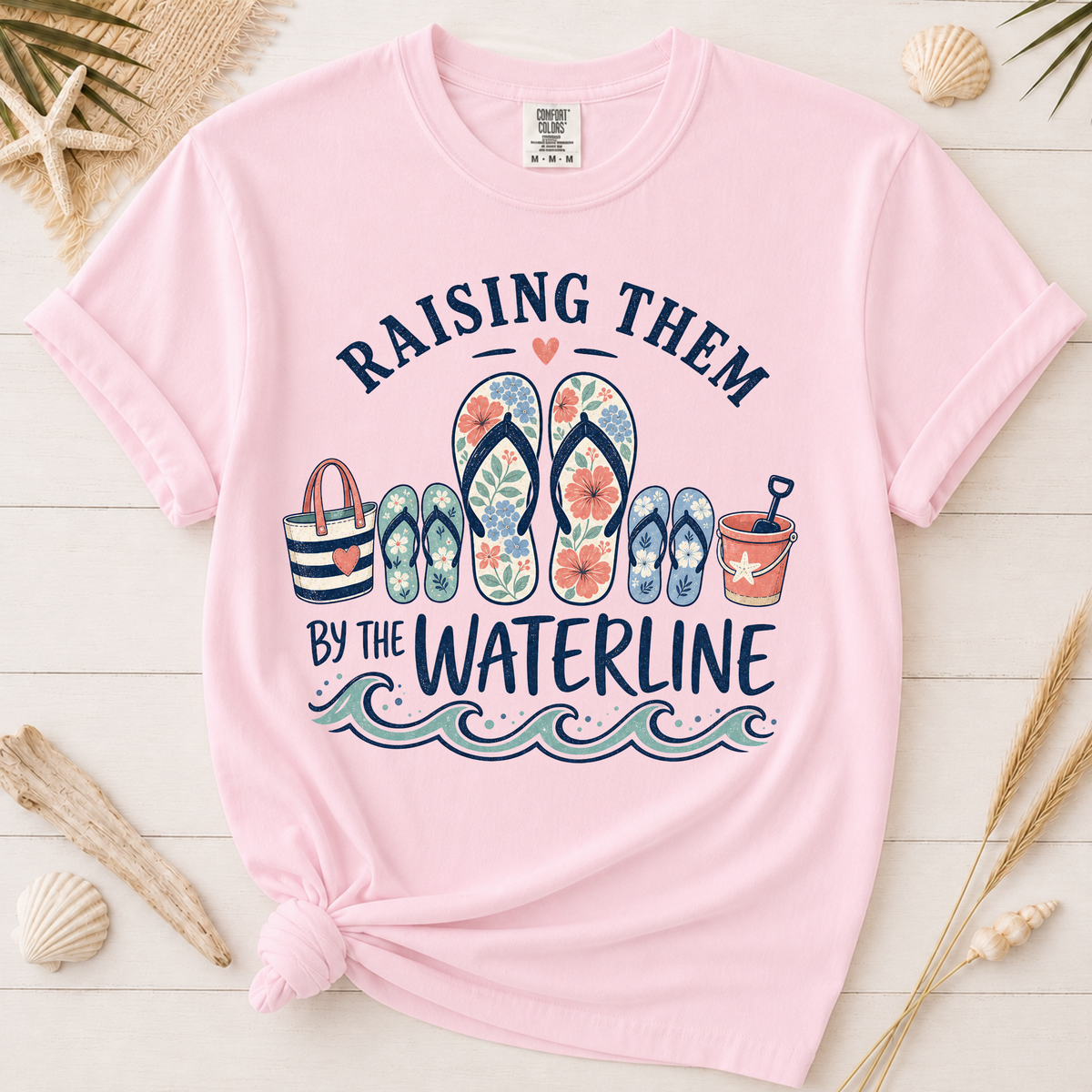 Raising Them by the Waterline Coastal Mom Graphic Tee